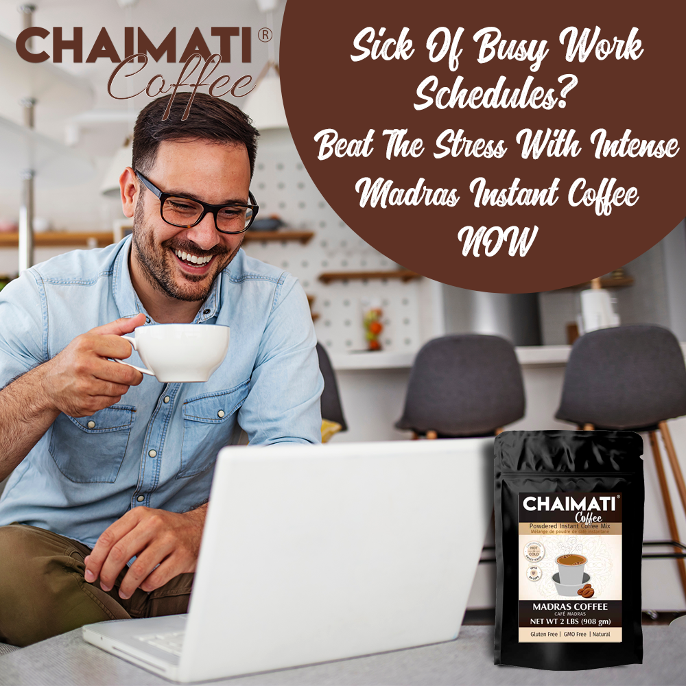 Man enjoying a cup of Chaimati premium coffee while working on laptop with Chaimati coffee pack displayed
