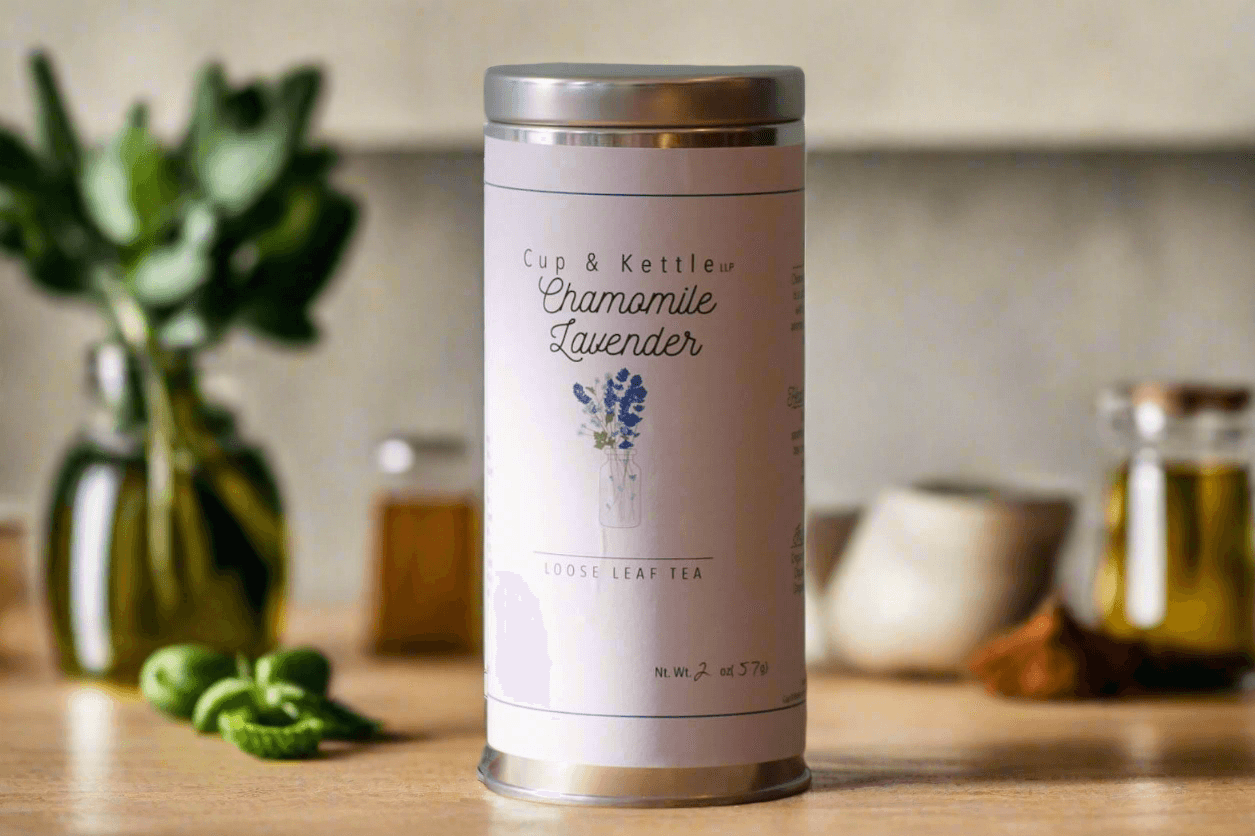 DC-Cup & Kettle Tea handcrafted chamomile tea tin with lavender on wooden surface with blurred background