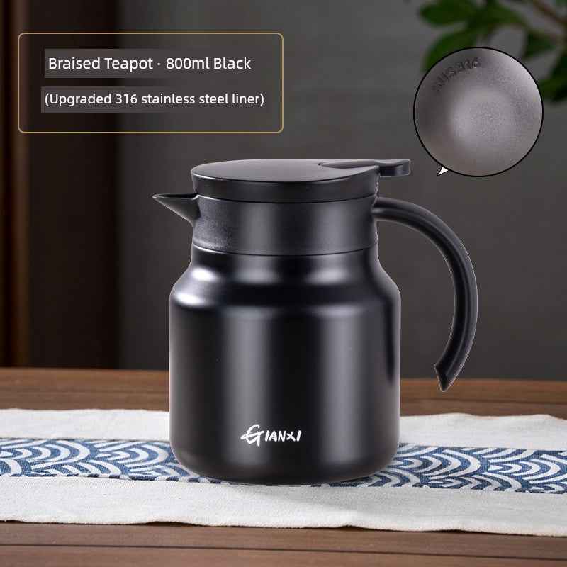 High-quality braised teapot 800ml black with upgraded 316 stainless steel liner on wooden table