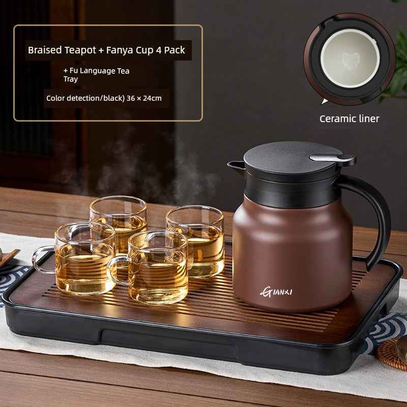 High-quality braised teapot with ceramic liner and four glass cups on a wooden tray set by Tea & coffee of the world