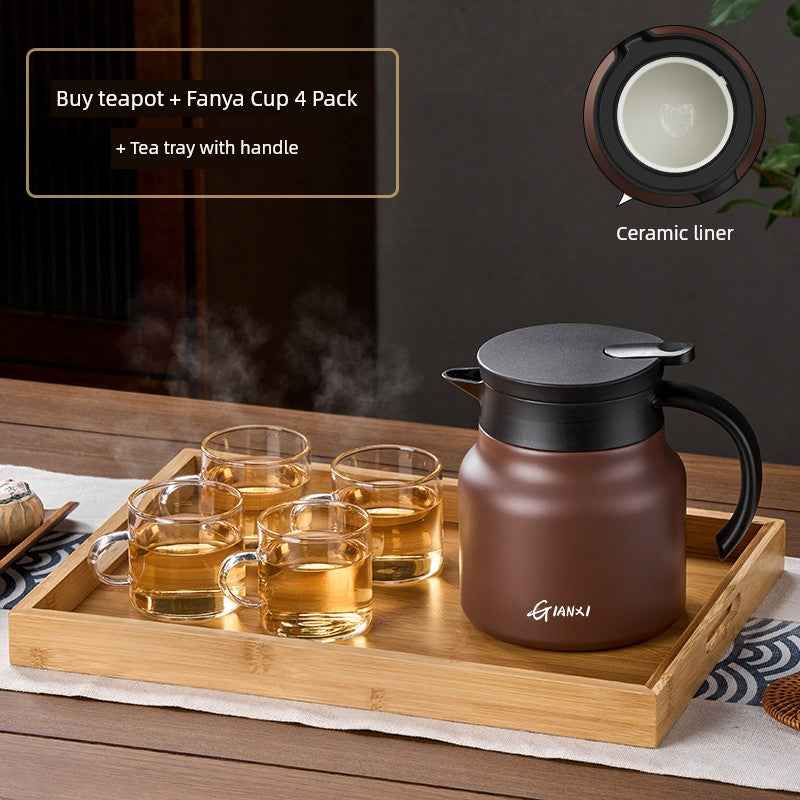 High-quality braised teapot with ceramic liner and four clear glass Fanya cups on a wooden tea tray