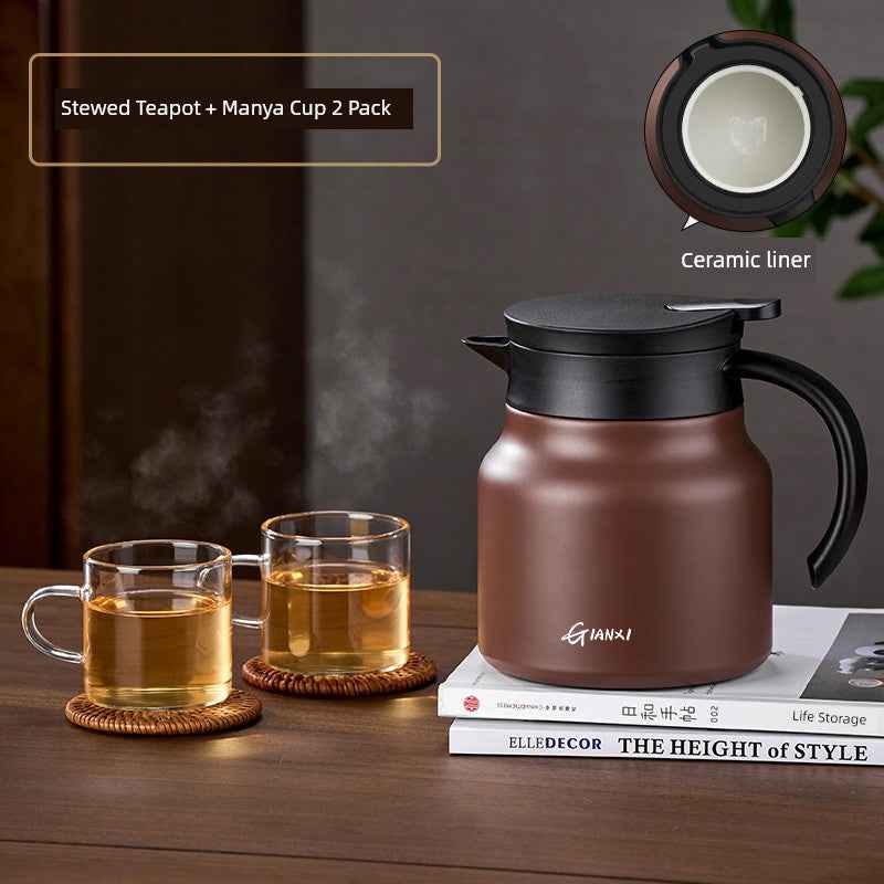 Tea and coffee of the world high-quality braised teapot with ceramic liner and two clear glass cups on wooden table
