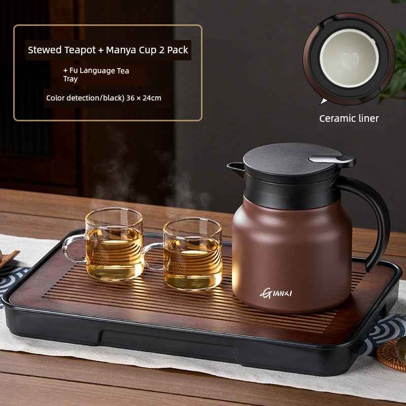 Tea & coffee of the world high-quality braised teapot with ceramic liner and two glass cups on a tea tray