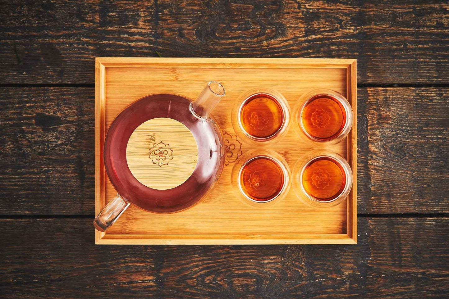 B.TEALY handcrafted glass tea set with teapot and four cups on a wooden tray