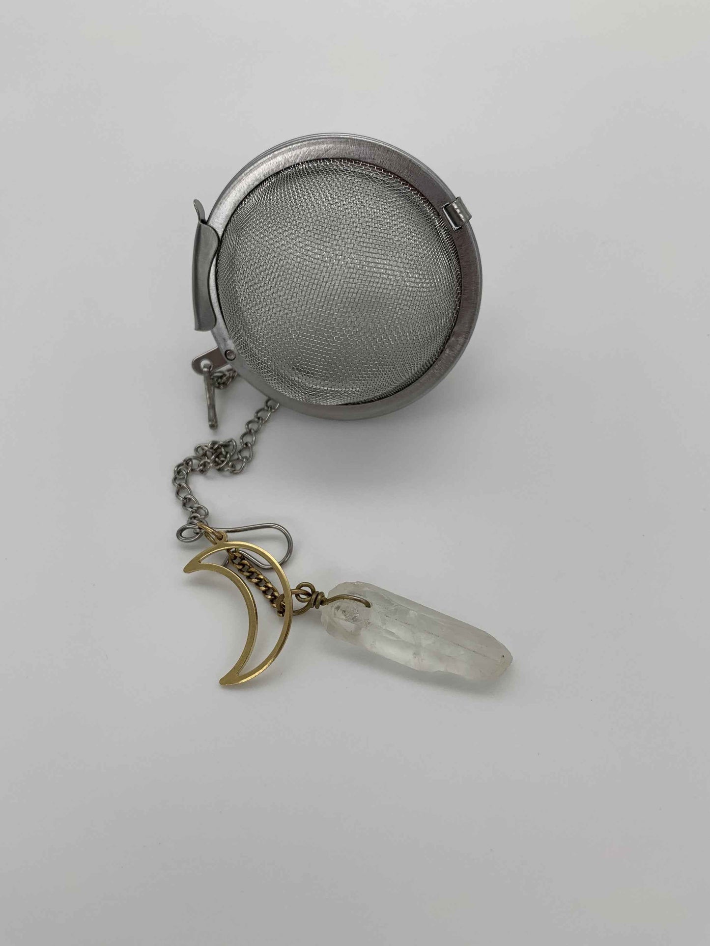 Yellow Coconut Premium Tea Infuser with Crystal featuring a mesh ball and crescent moon charm