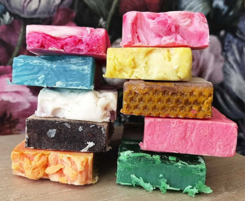 Colorful handmade organic soap bar collection stacked showcasing vibrant natural ingredients and artisan craft