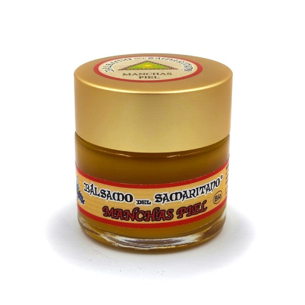 Tea & Coffee of the World herbal hyperpigmentation treatment balm in a small glass jar with gold lid