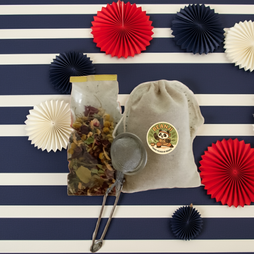 Tea and Coffee of the World lemon hibiscus herbal tea bag with infuser and decorative background