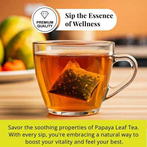 Glass cup of organic papaya leaf tea with tea bag steeping for natural wellness and vitality