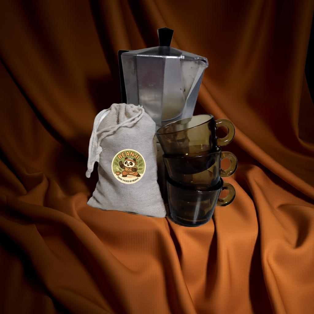 Coffee setup with exclusive European coffee beans bag, silver moka pot, and three stacked brown glass cups