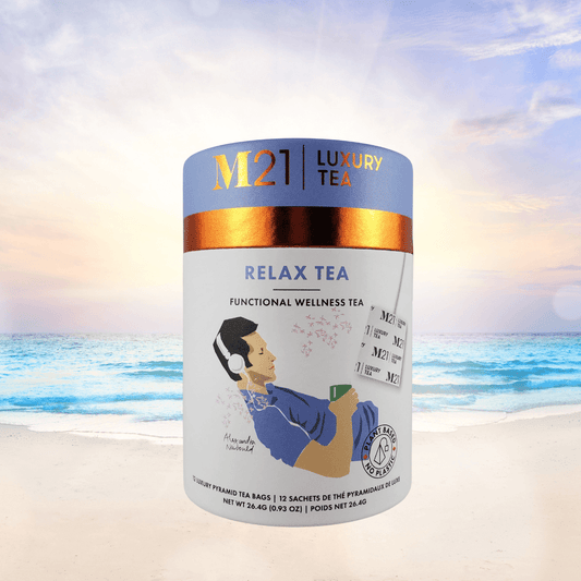 DC-Tega Tea M21 Luxury Relax Tea herbal tea container labeled relaxing tea for stress relief on beach background
