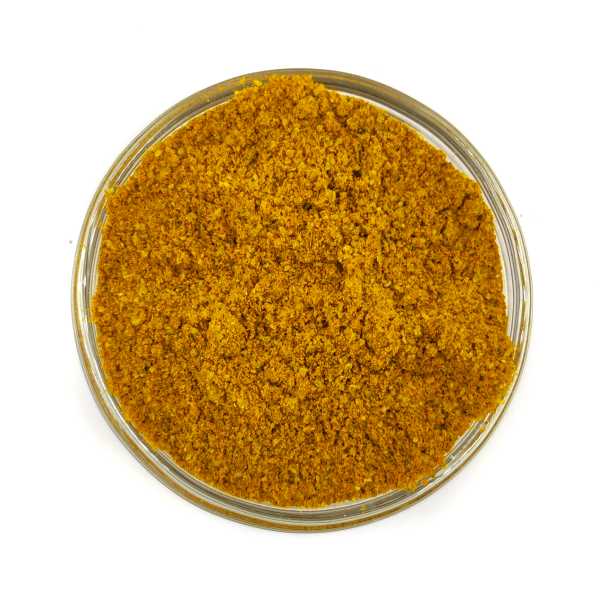 Tea & Coffee of the World organic Granada spice blend in a clear glass bowl Fresh aromatic ground spices