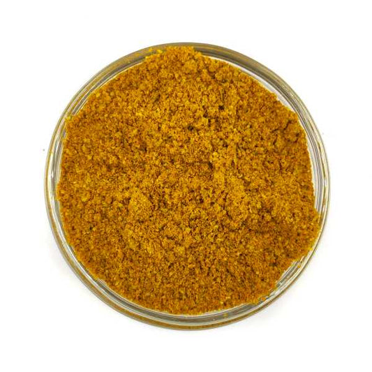 Tea & Coffee of the World organic Granada spice blend in a clear glass bowl Fresh aromatic ground spices